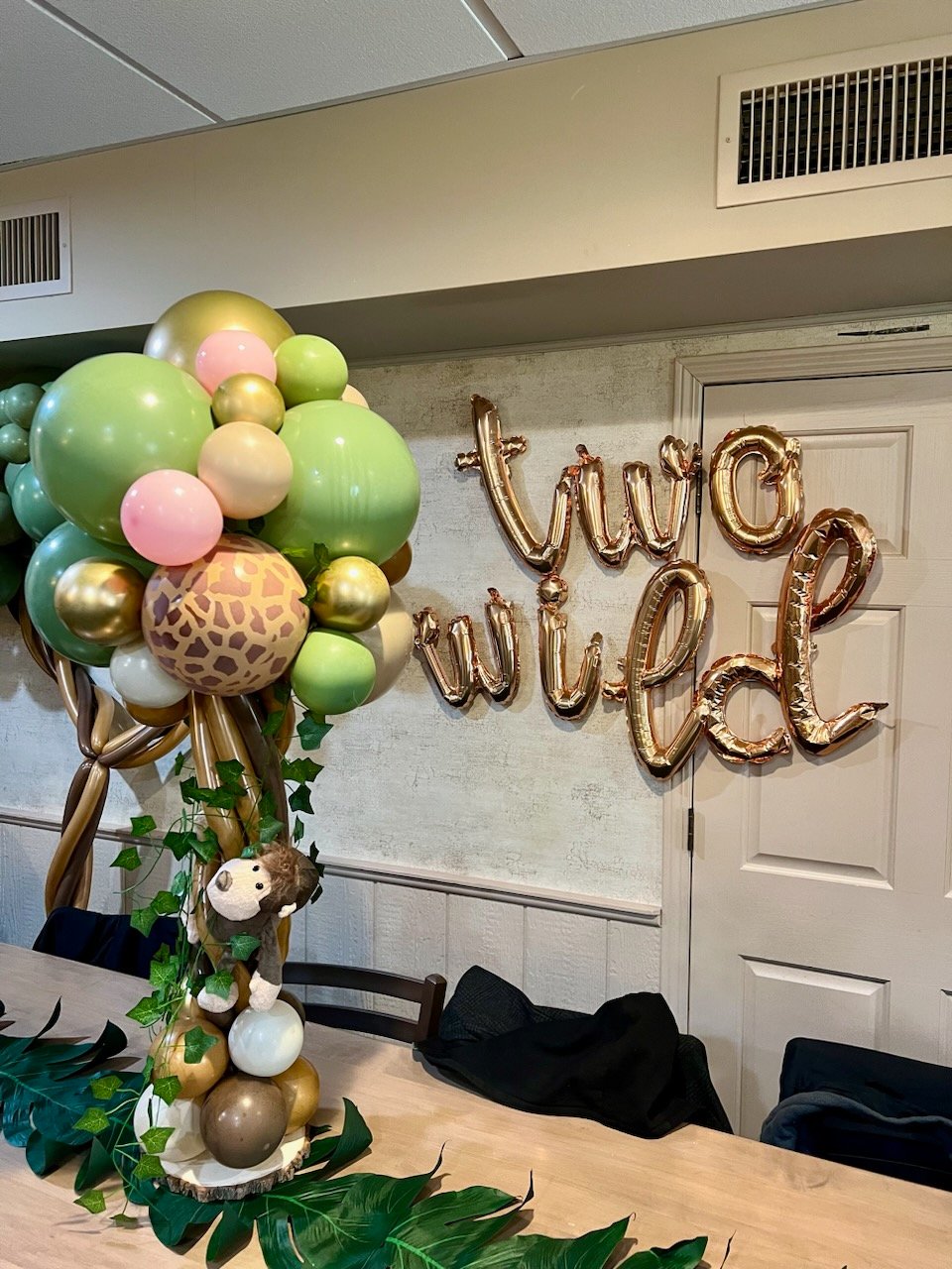 Safari themed second birthday balloon centerpiece tower by Balloon Trace near Joliet