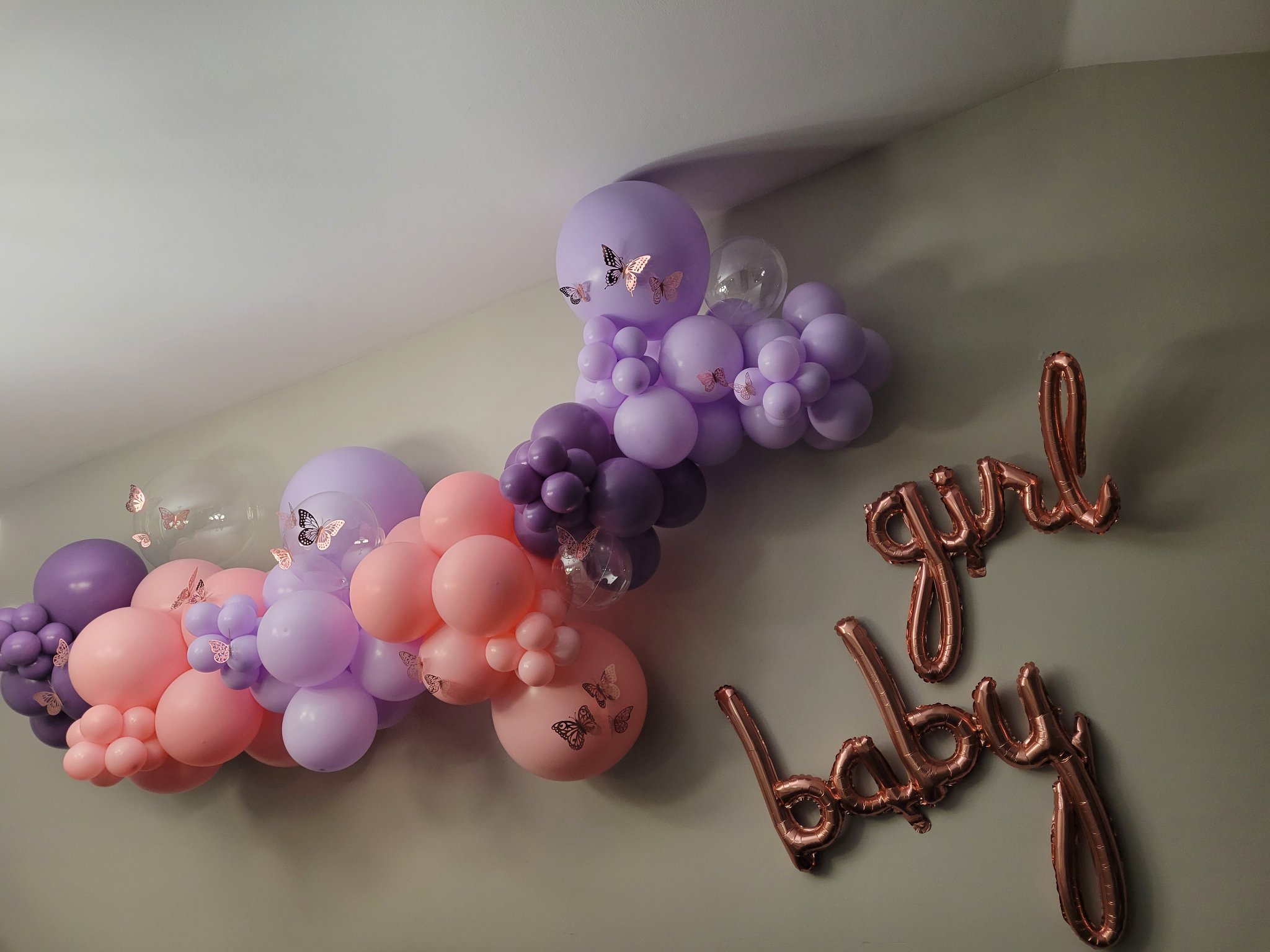 Blush and lavender butterfly baby shower balloon garland by Balloon Trace Plainfield IL